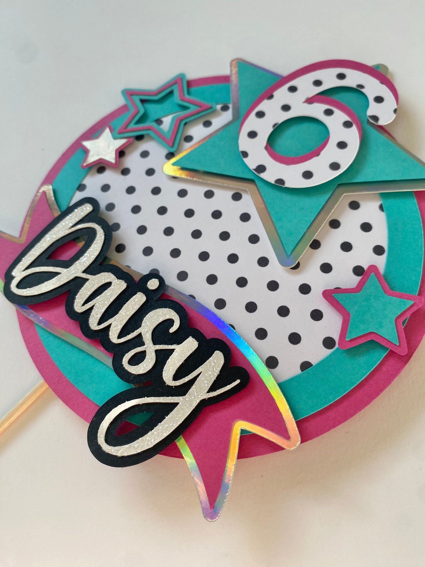 Polka dot doll surprise cake topper